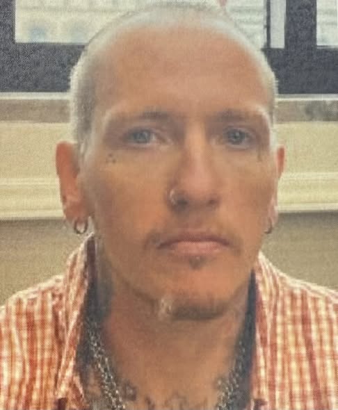 Man Shot in Parking Lot Dispute, Suspect on the Run in Marion